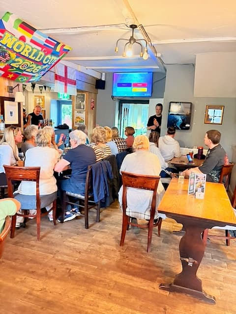Teams playing the quiz in the second room at The Anchor, Stanwell Moor