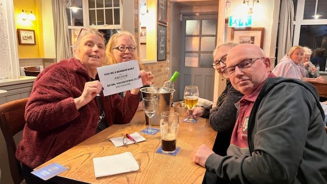 Quiz night winners with their prize at The Anchor