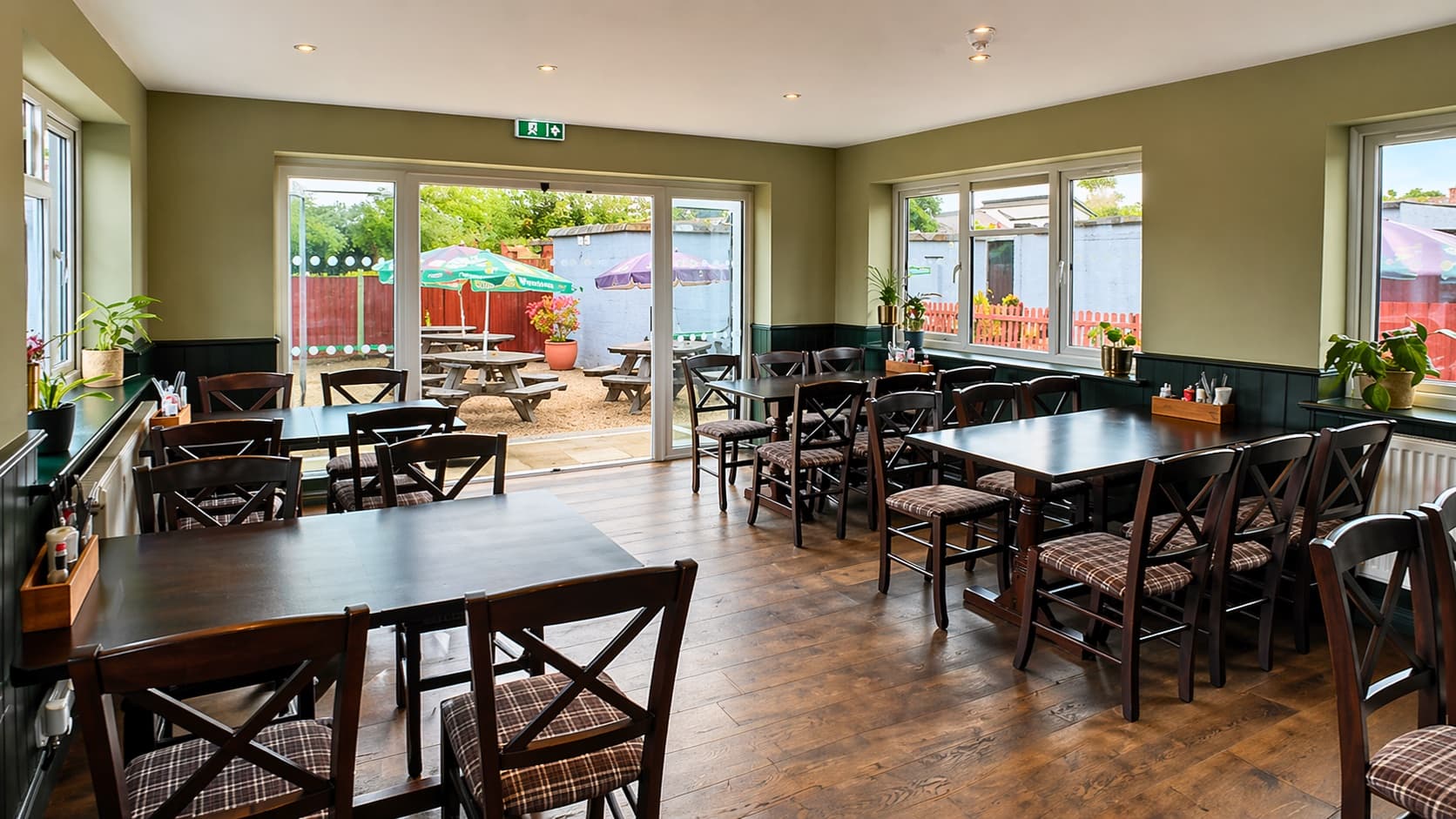 View from The Anchor dining room through french doors to the garden