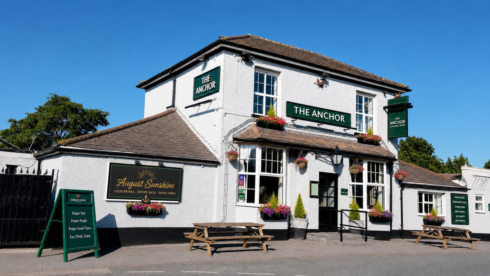The Anchor pub beer garden enjoying gentle summer sunshine.