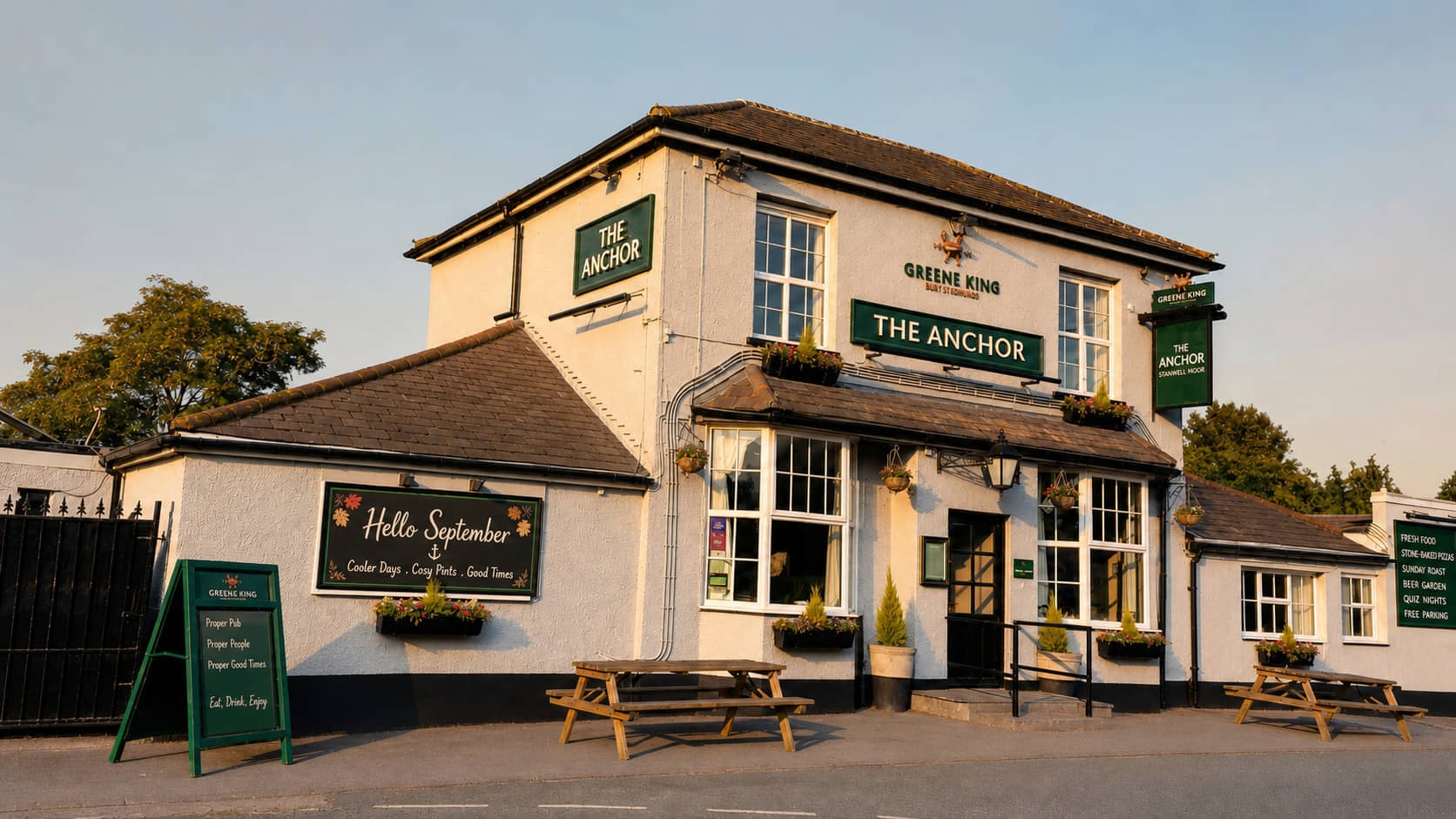 The Anchor pub surrounded by rich autumn colour.